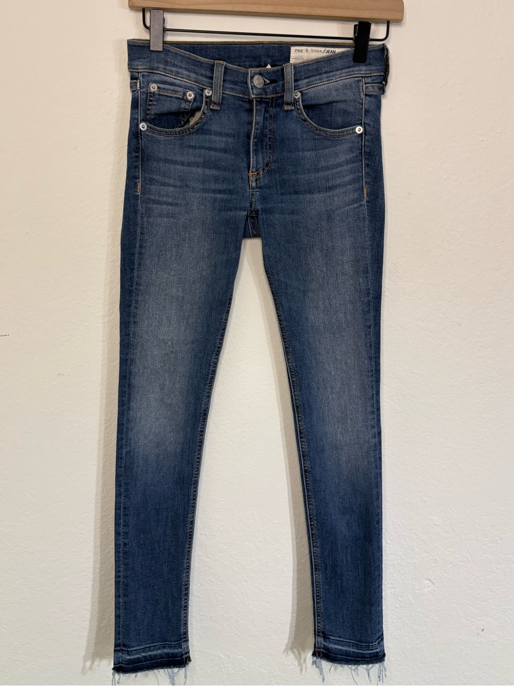 Rag & Bone medium / dark wash skinny jeans with frayed hems size 25n